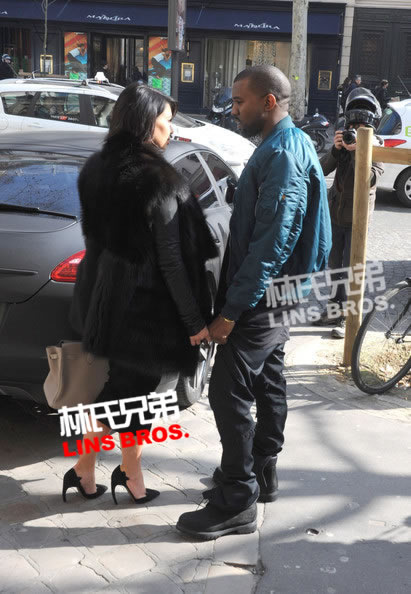 Kanye West和怀孕女友Kim Kardashian巴黎街头散步 (照片)