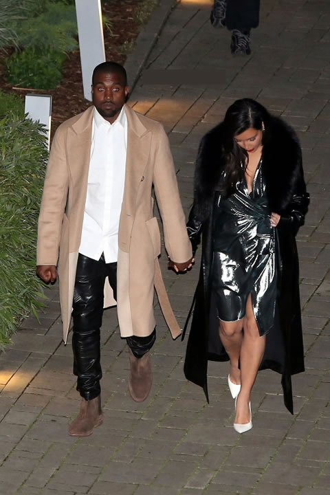 Kanye West和老婆卡戴珊自己刚刚结婚完 出席他的造型师婚礼 (照片)