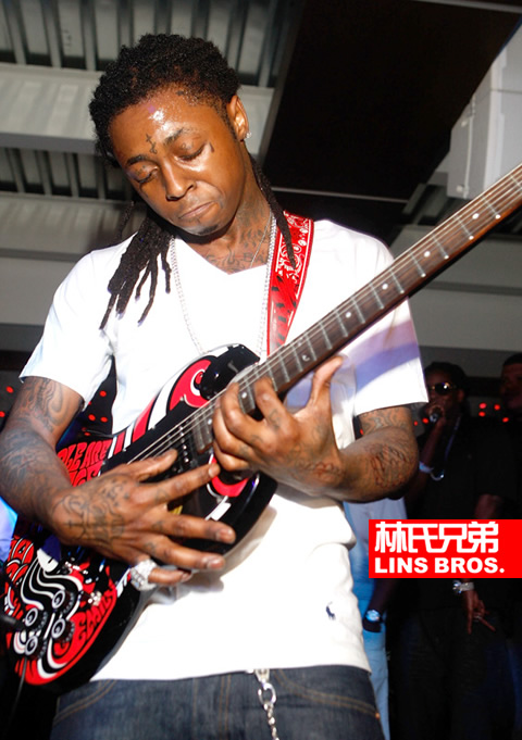 Lil Wayne不仅是伟大的说唱歌手..也擅长玩吉他..新歌再来点摇滚元素? (照片)