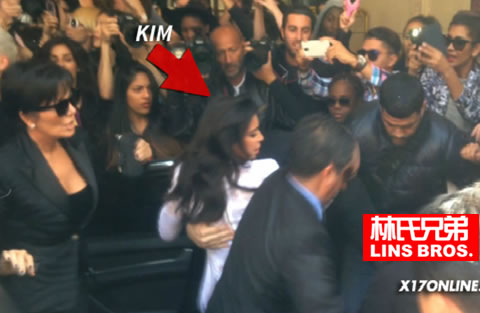 疯了! 卡戴珊在巴黎受到肢体攻击..差点倒地..场面非常乱..老公Kanye很紧张迅速上前接应 (视频)