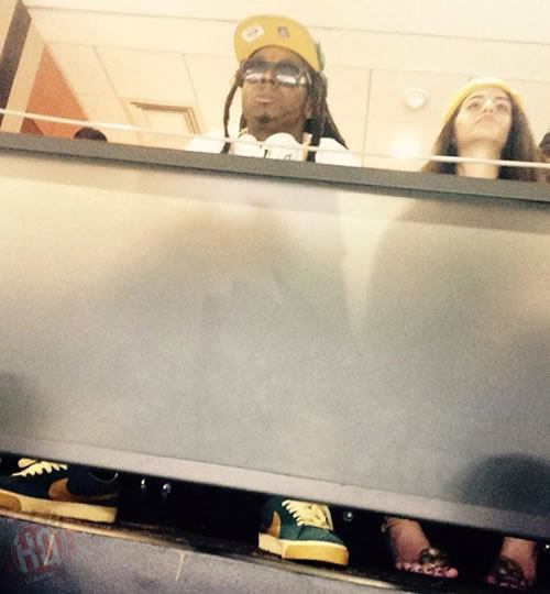 Lil Wayne绯闻女友Christina Milian怒了..因为看见Lil Wayne与前未婚妻复合一起看球赛? (照片)