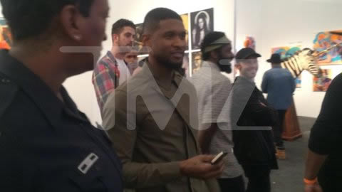 你能想到吗！Usher为他的iPhone充电..充电器是一全裸女人的隐私部位..(9张照片)
