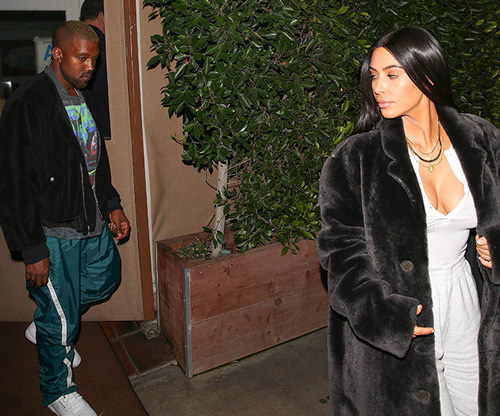 Kanye West罕见运动长裤出场..几个月中他第一次和妻子卡戴珊一起公开露面..粉碎离婚传闻 (照片)