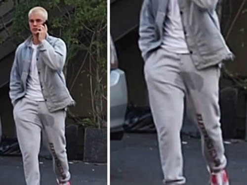 屌..Justin Bieber直接尿裤子逛马路..异常的酷 (照片)