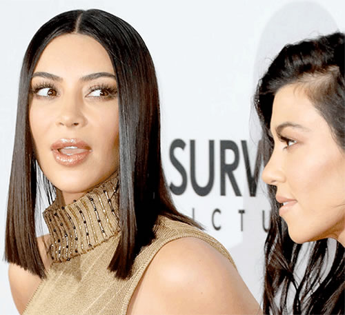 当Kim Kardashian穿的这么多的时候显得更加Sexy..CRAZY (照片)