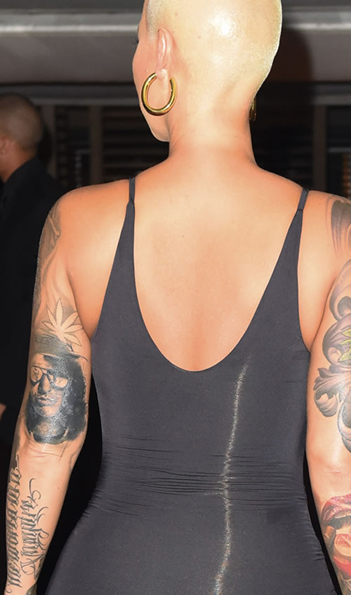 结束了..也是开始..Amber Rose抹去胳膊上的前夫Wiz Khalifa纹身