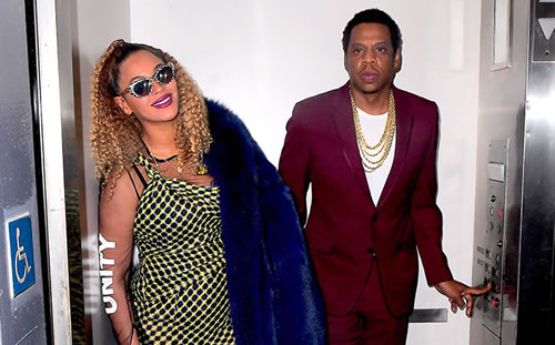 女王Beyonce陪嘻哈大亨老公JAY Z过生日..Hov遇上狗仔本能地赶紧关电梯门