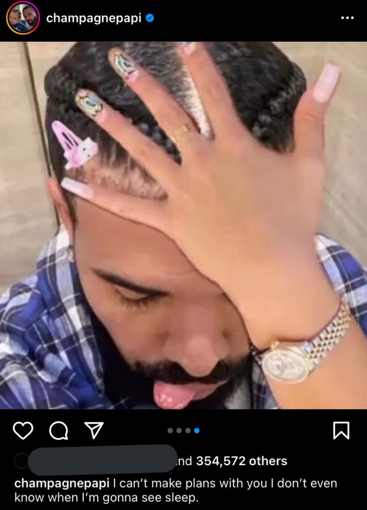 Drake照片上这个女人的手是谁的?